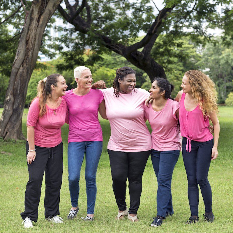 nonprofit web design group of women wearing pink shirts